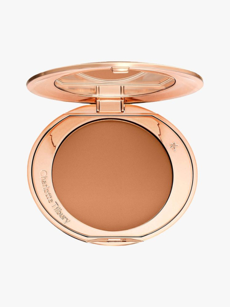 Charlotte Tilbury Airbrush Flawless Finish Powder round rose gold compact of pressed powder on light gray background