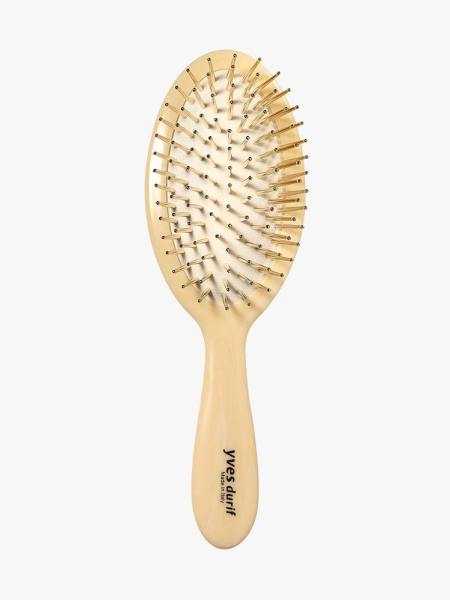 Yves Durif Brush D'Or in branded component on a light gray background